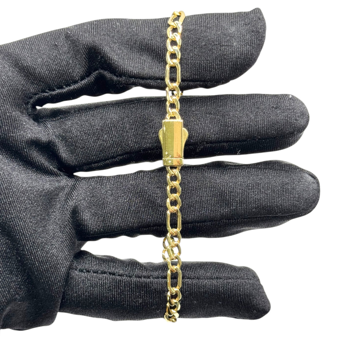 Pulsera Fígaro con Broche Liso en Oro 10k
