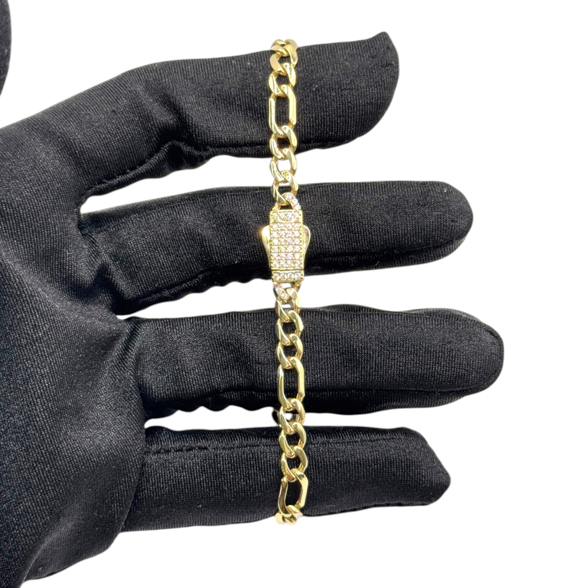 Pulsera Fígaro con Broche de Zirconias en Oro 10k