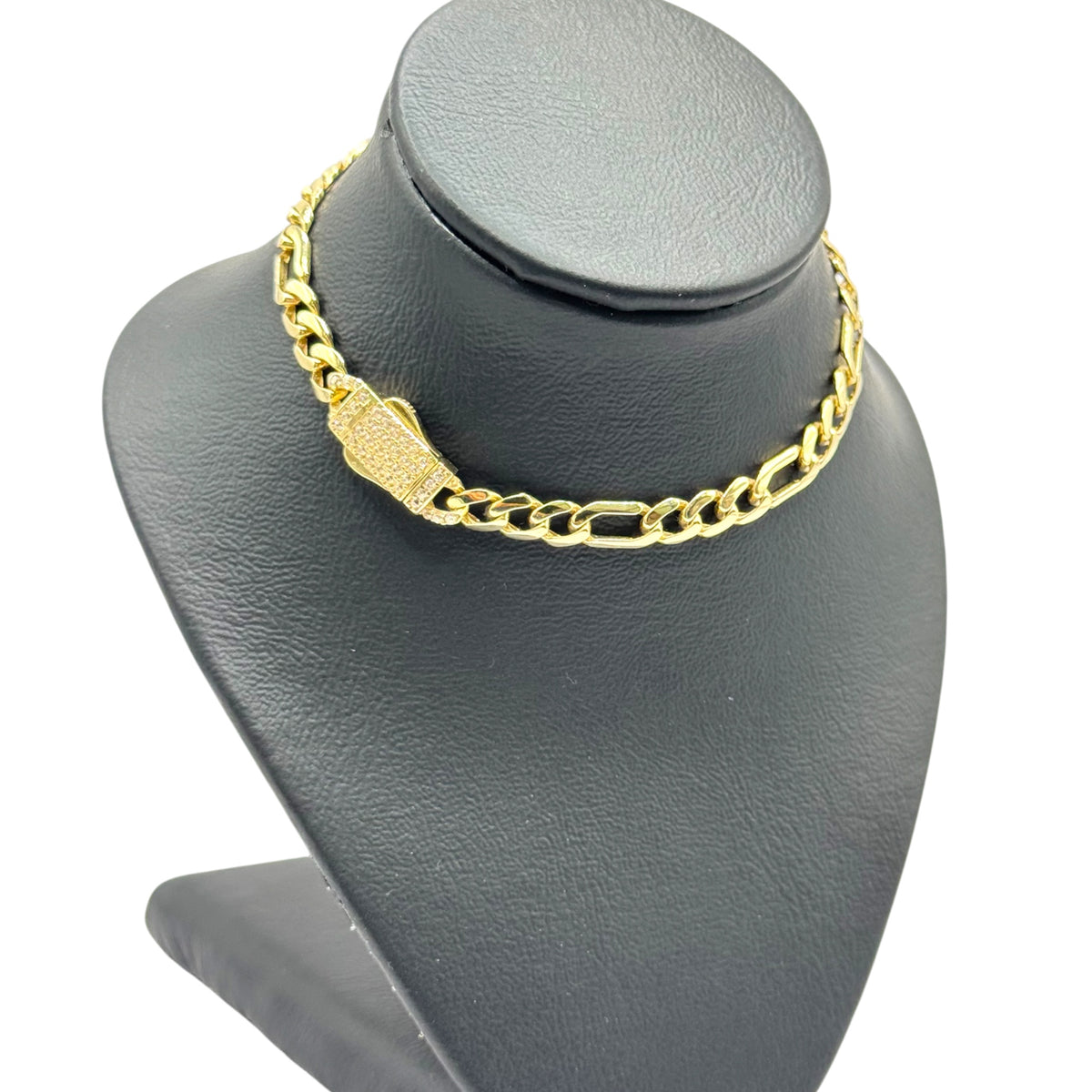 Pulsera Fígaro con Broche de Zirconias en Oro 10k